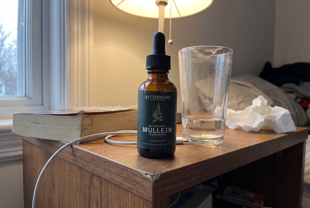 The BetterLungs tincture on a cluttered bedside table